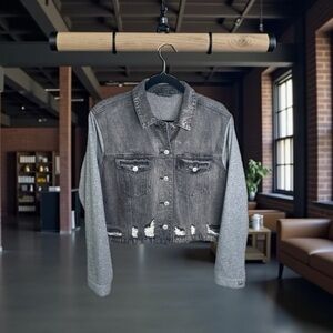 A touch of edge distressed denim jacket blends classic & modern comfort.